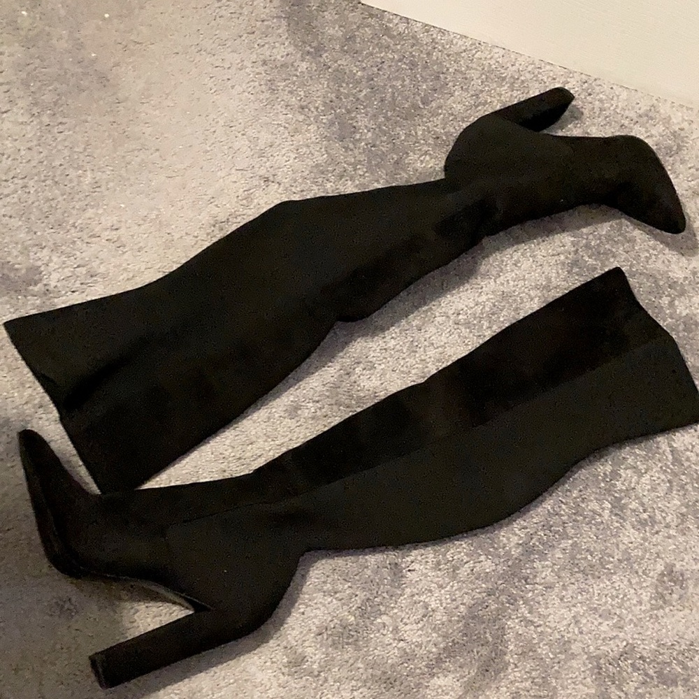 Steve Madden beautiful black over the knee boots.
